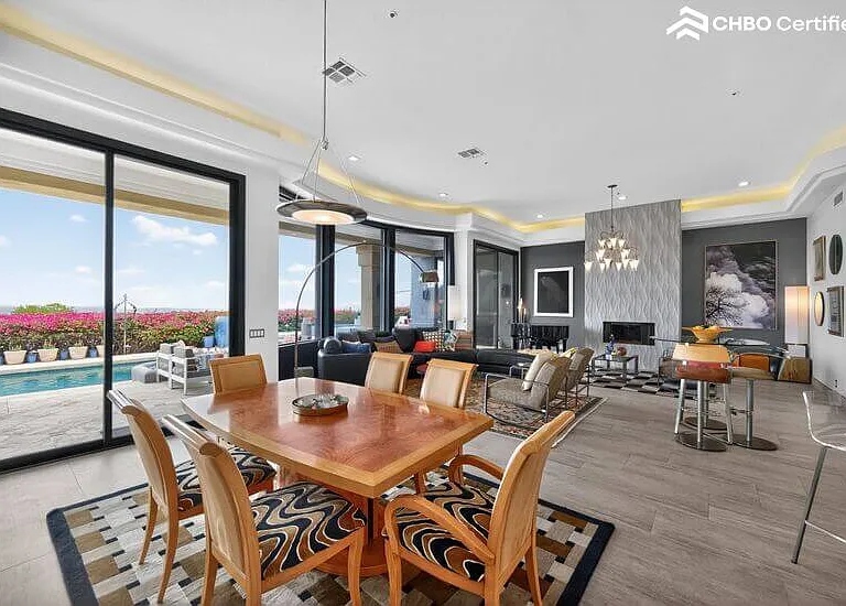 Elegant dining for 8 w/ pool & fireplace views