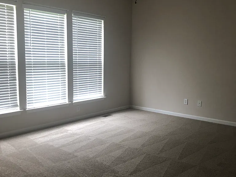 Master BR on main level overlooking back yard.