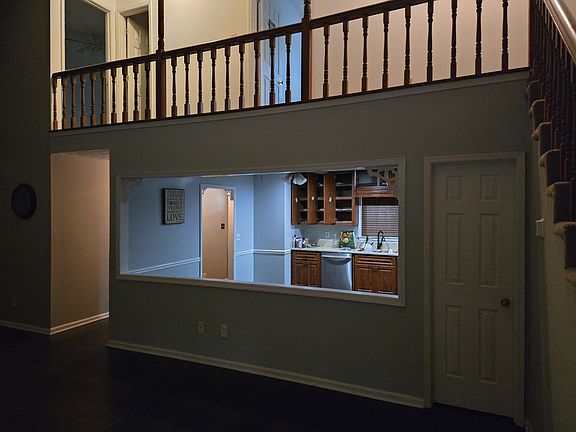 kitchen and overlook into famliy room