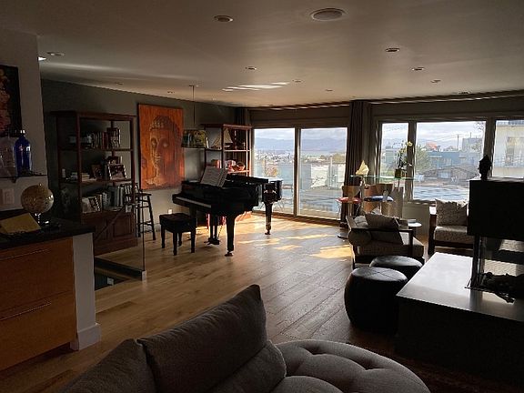 Wood Floors, 3-way Fireplace and Grand Piano
