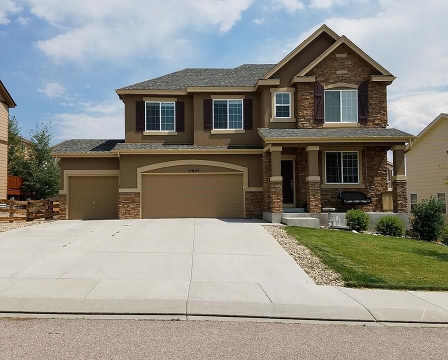 Beautiful 2 Story Home With Three Car Garage, Front Porch, faces West for View of Mountains.