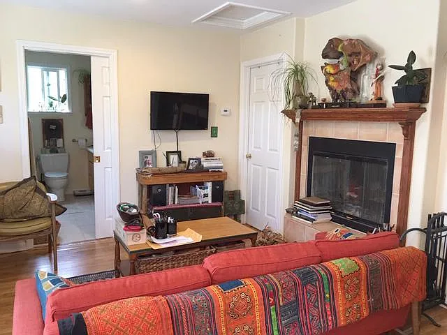 Living room #1 looking towards bathroom and bedroom