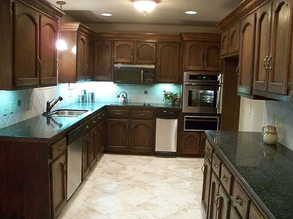 Remodeled kitchen with granite counter tops, new stainless steel appliances