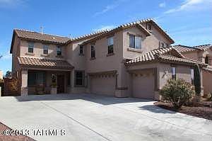 Front of home- with 3 car garage