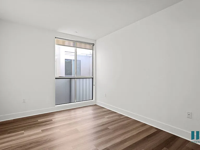 Bedroom with Large-Size Windows and Vinyl Flooring