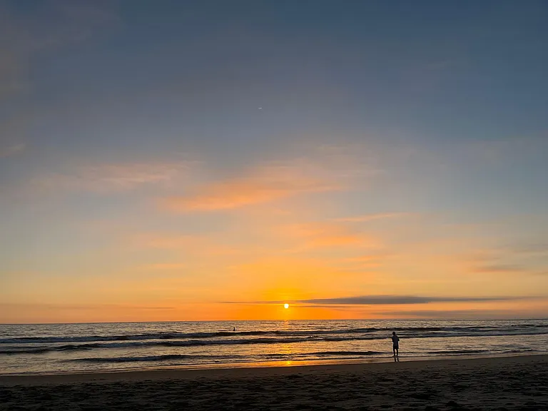 Enjoy nightly sunsets right across the street from the beach!
