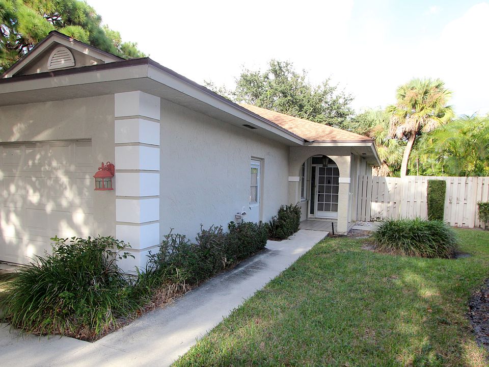 Front Exterior offers covered entry