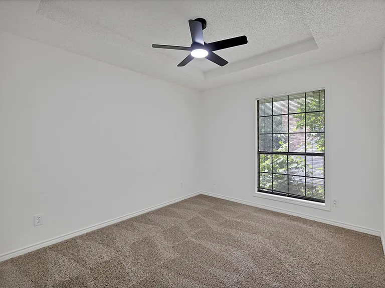 One of the three upstairs bedrooms.