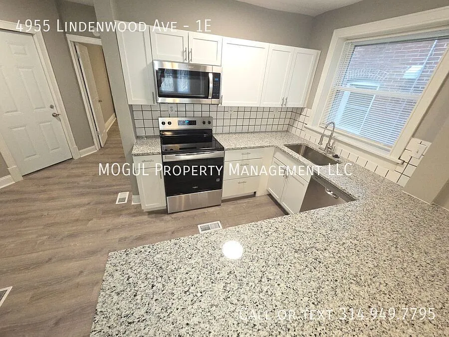 Building Photo - 4955 Lindenwood Ave #1E