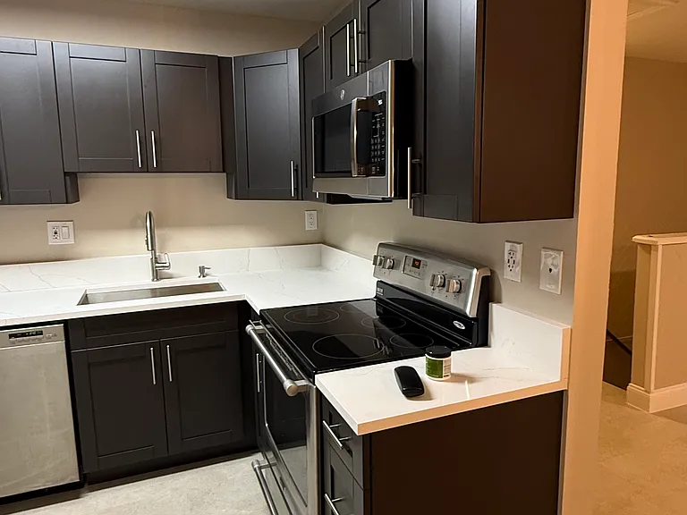 106 Gardens Dr #203 — Photo 1