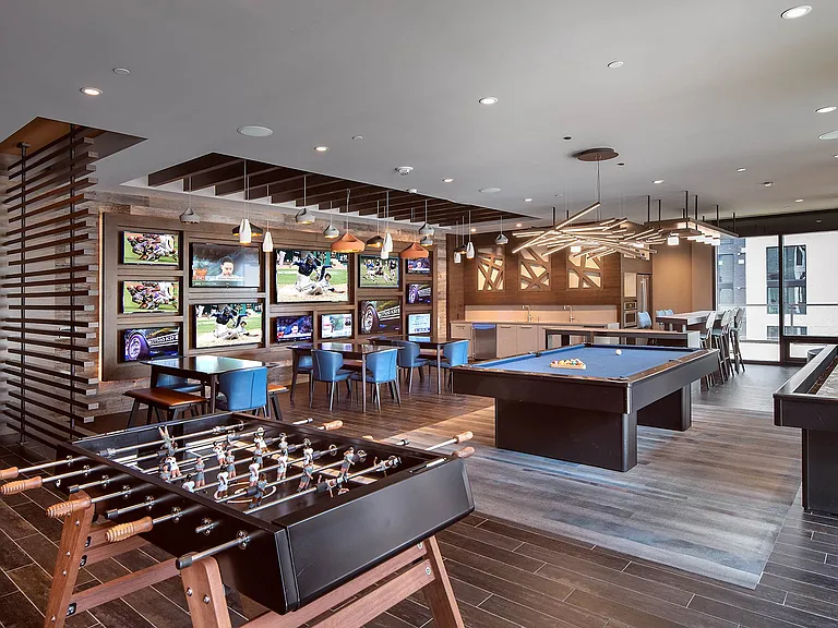 The Commons features HDTV sports wall, entertainment kitchen, billiards, shuffleboard, and foosball