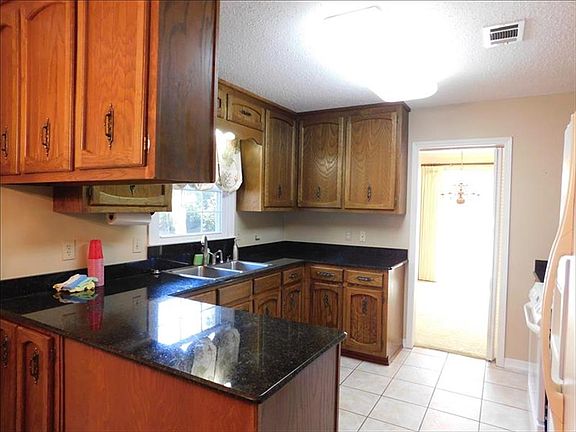 Kitchen , Granite counters,  ceramic tile floor