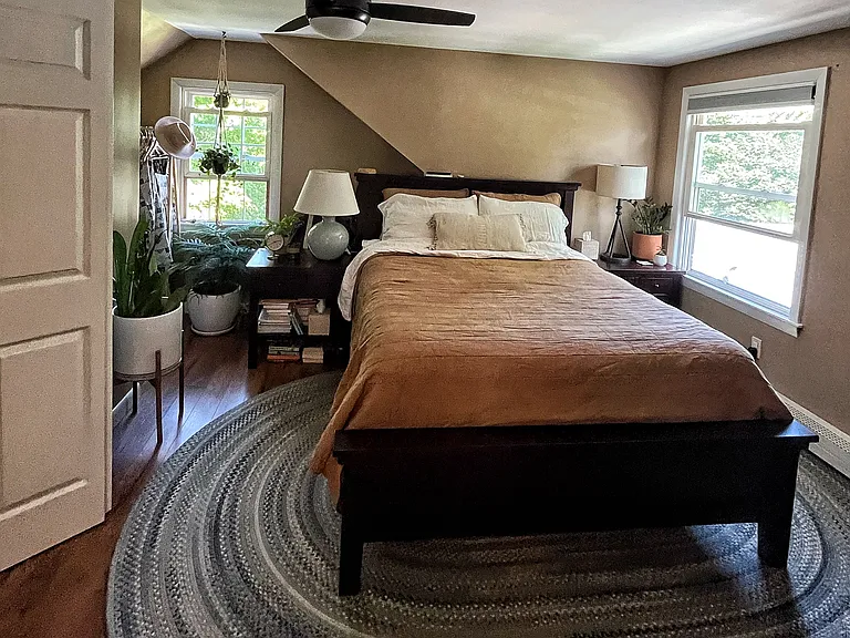 Master bedroom on second floor has a large walk in closet, a nook for storage or reading, and plenty of room for a king sized bed.