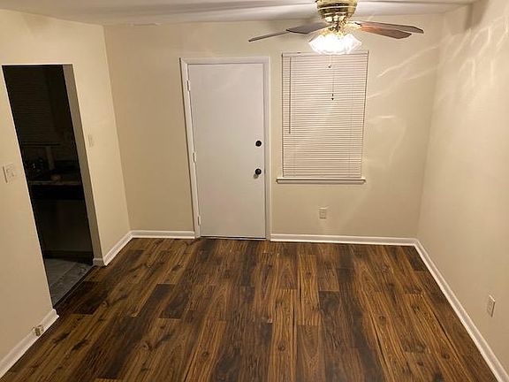 Dining room just off kitchen with access to rear yard.