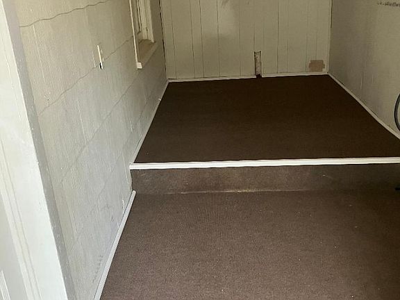 covered porch has hookups for washer and dryer