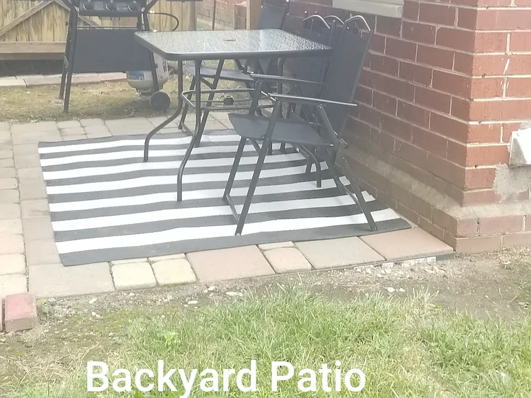 Covered back patio, table and 4 chairs, Gas Grill