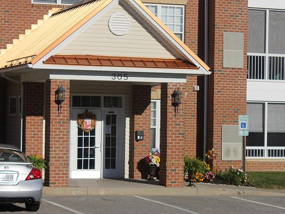 Front door to condo with security access