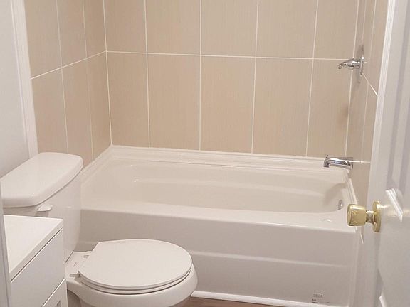 UPDATED BATHROOMS - TILE SHOWERS!