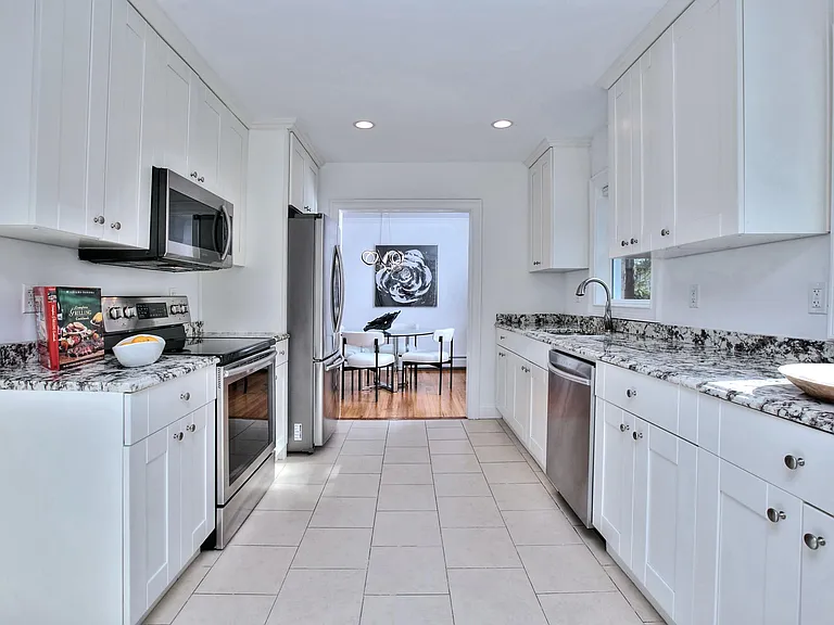 Beautiful kitchen overlooking the backyard.