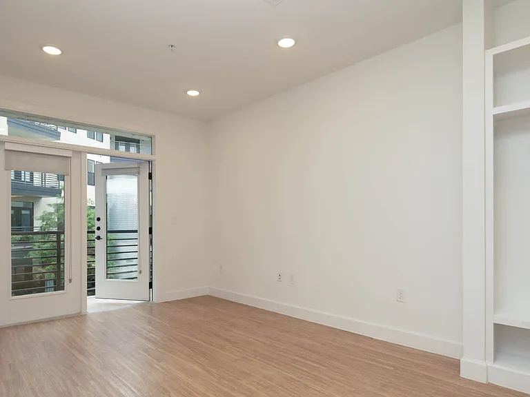 Living Room with Balcony and Hard Surface Flooring