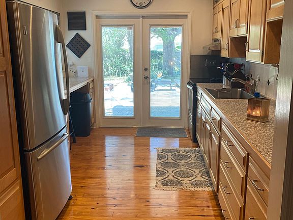 Kitchen with wood cabinets