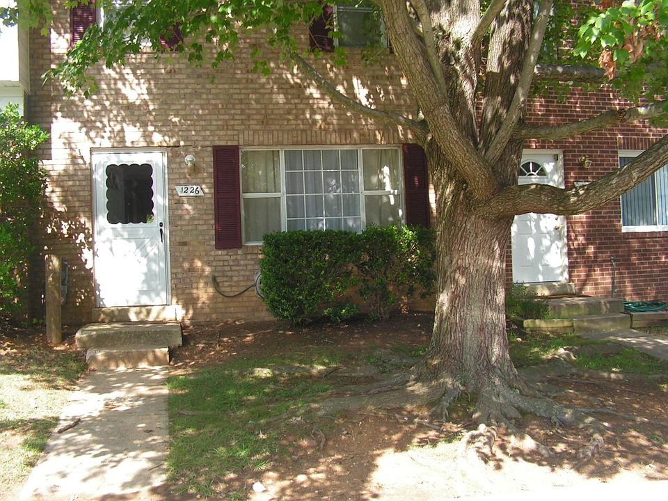 Front of home, tree removed due to overgrowth. I hated to get rid of the maple
