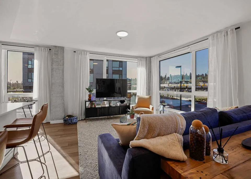 2-Bedroom Model - Living Room with Large Windows and High Ceilings