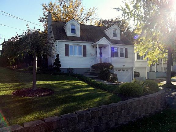 Beautifully Landscaped Corner Lot, Impeccably Maintained Home!