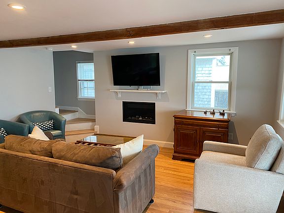 Living Room with TV and Fireplace
