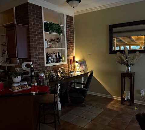 Office or study area. To the left of this is the kitchen.