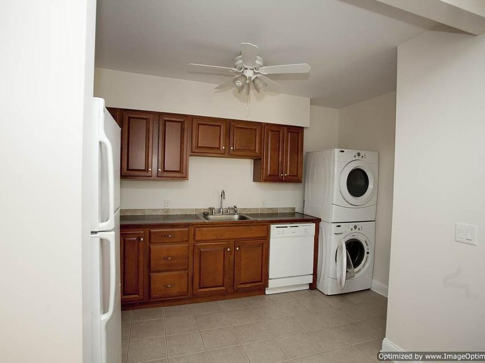 Kitchen with high efficiency washer/dryer stack