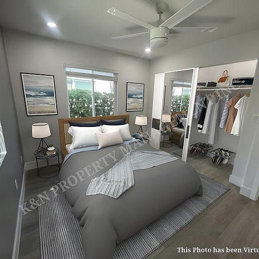 large bedroom with large closet and can lights throughout. Corner unit, lots of natural light.