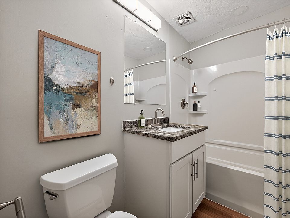 Elevate your living experience at Park Village West with this stylish bathroom featuring modern fixtures and serene decor. Enjoy the perfect blend of comfort and functionality. Schedule a tour today to see it in person!