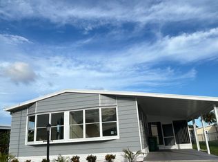 911 Hyacinth Cir, Barefoot Bay, FL 32976