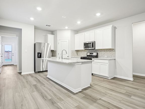 Cook a delicious meal in this beautiful kitchen.