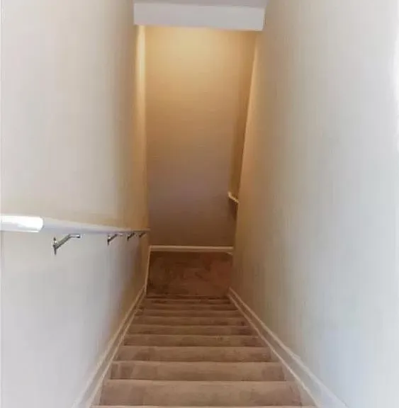 to basement bedroom stairs 1/2