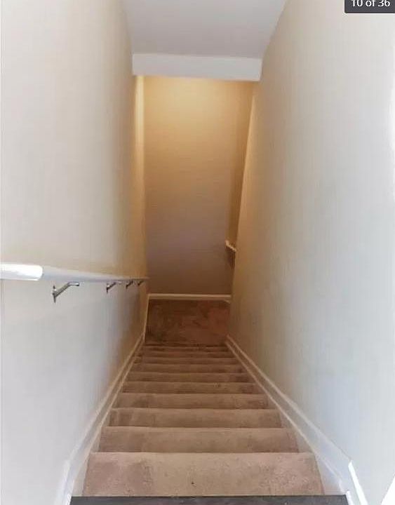 to basement bedroom stairs 1/2