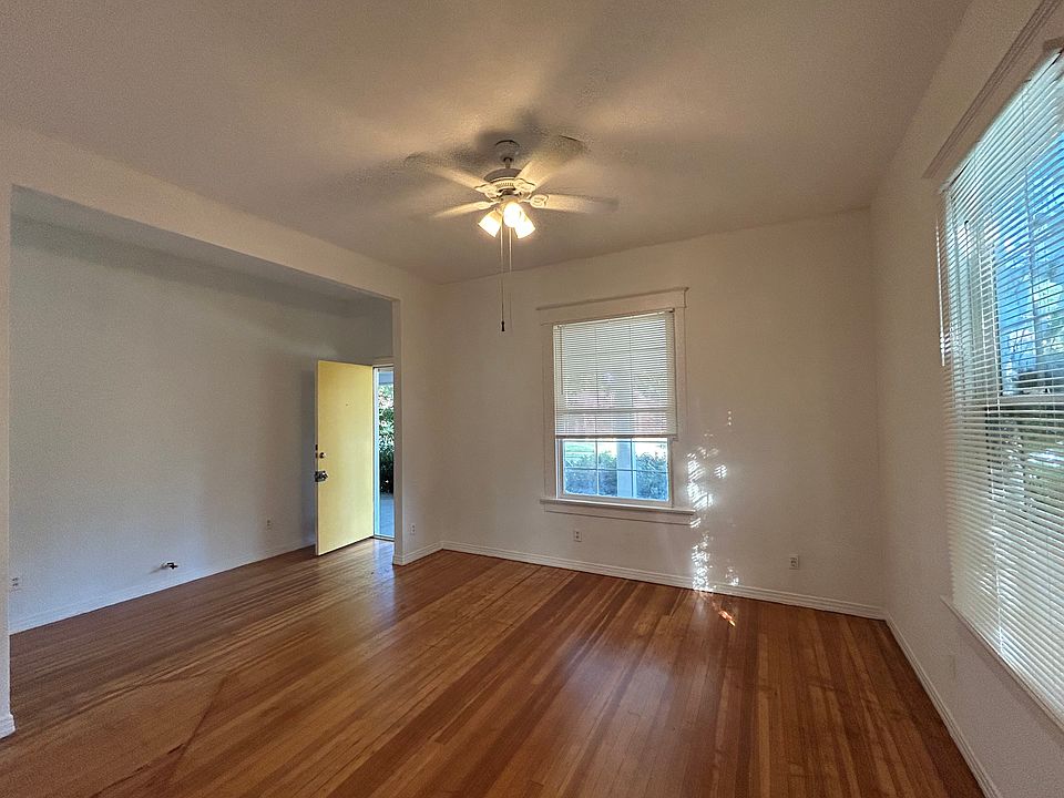 Living Room 1 - tall ceilings, ample space , original hardwood floors