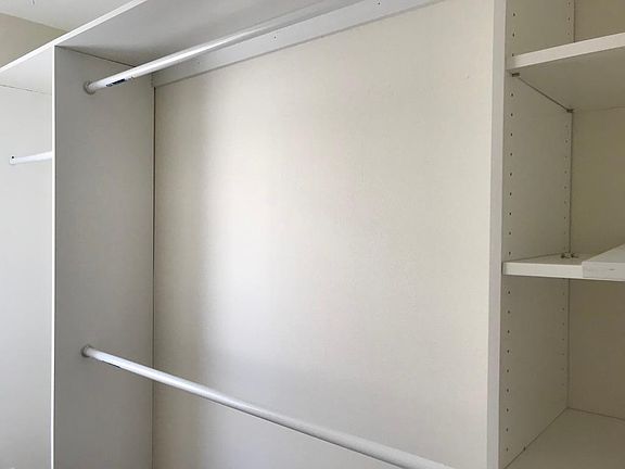 Walk in closet in master bedroom