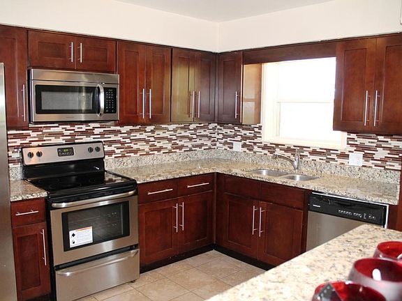 1 kitchen granite cherry stainless steel