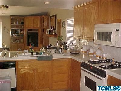 Kitchen w/breakfast bar Open to Living Room