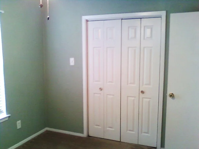largest bedroom with 8 ft. closet