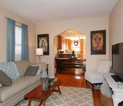 View from living area into dining and kitchen areas.