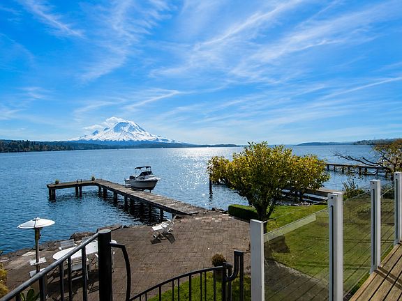 Enjoy dawn on upper deck and dusk on lake front patio