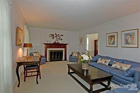 Formal Living Room w/firepl and hideaway built-ins