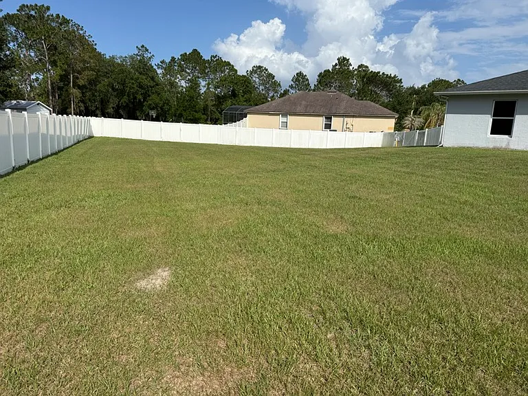 Backyard completely fenced