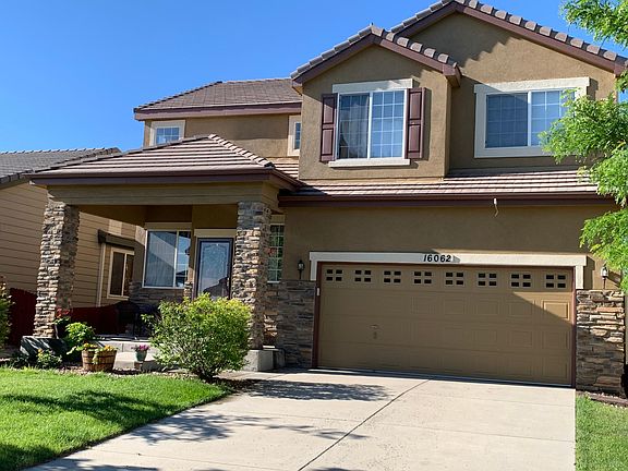 Front of 16062 E. 96th Way