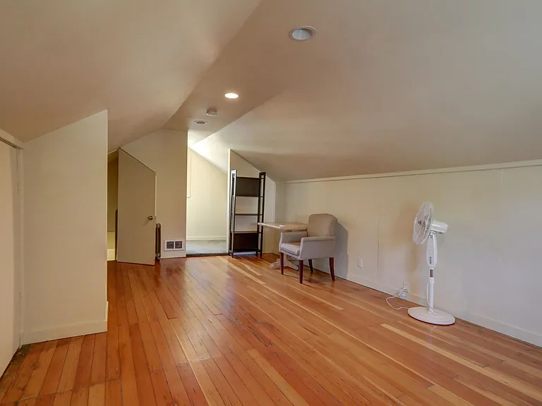 Upper floor bedroom, real wood floors, well lit!