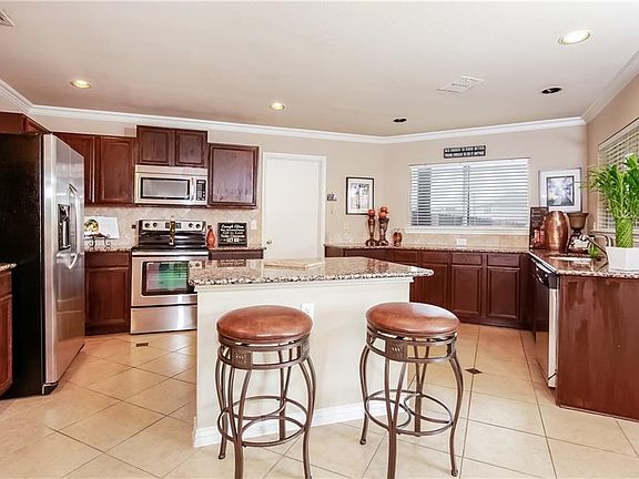 This is a great kitchen to prepare meals.  Cabinet and counter space galore!