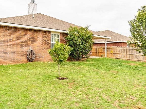 View 2 of Rear of home and yard.